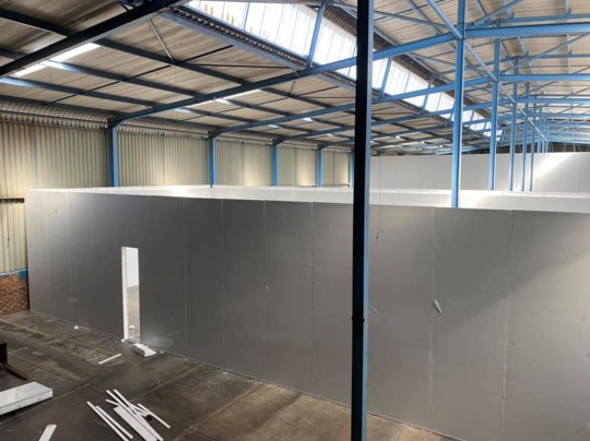 White panels installed in warehouse